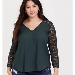 Never worn green blouse with lace sleeves